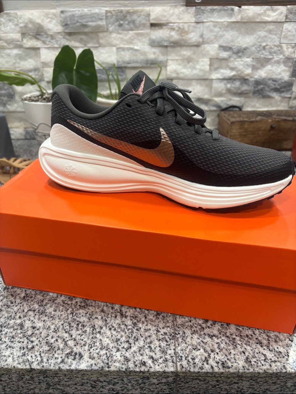 Nike Women’s Black Sneakers with Rose Gold Swoosh